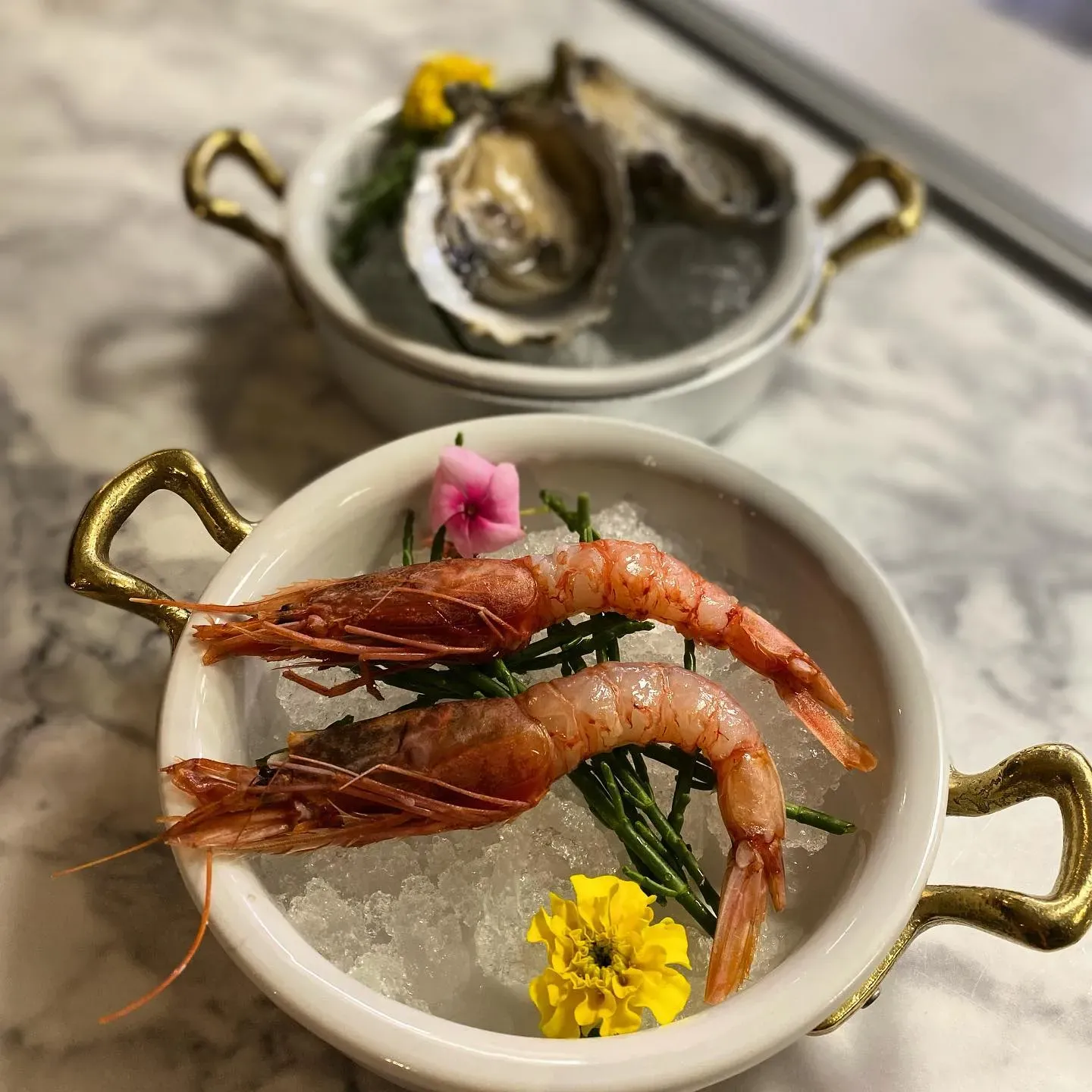 piatto di pesce fresco cucina mediterranea Bergamo